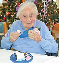 Peggy (Reichel) Haase enjoys a piece of cake on her 105th birthday in 2012!